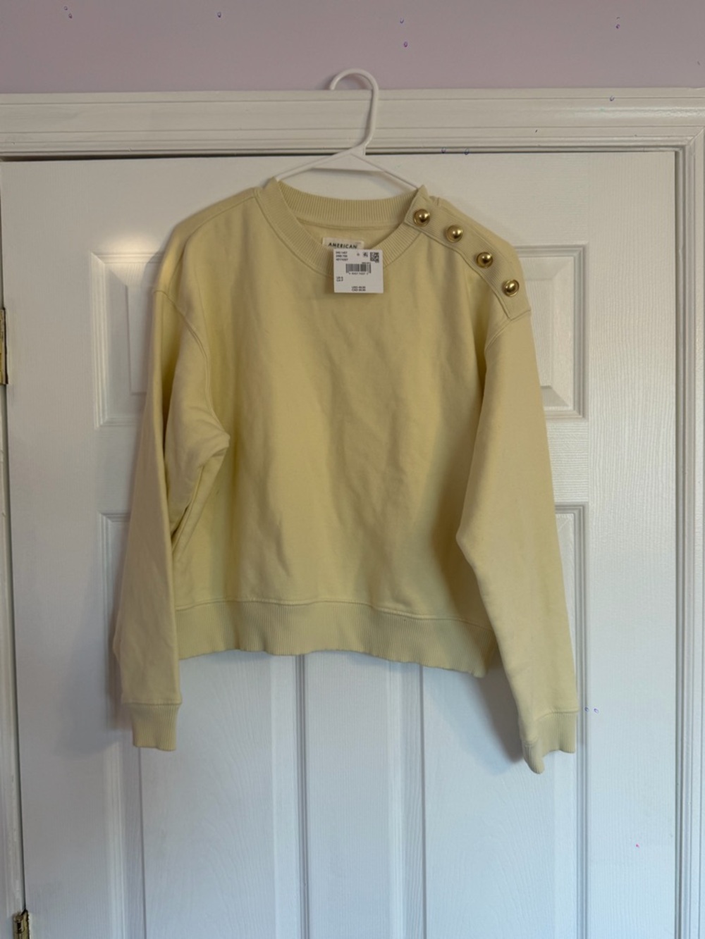 Pale Yellow Crewneck Sweater with Gold Shoulder Buttons